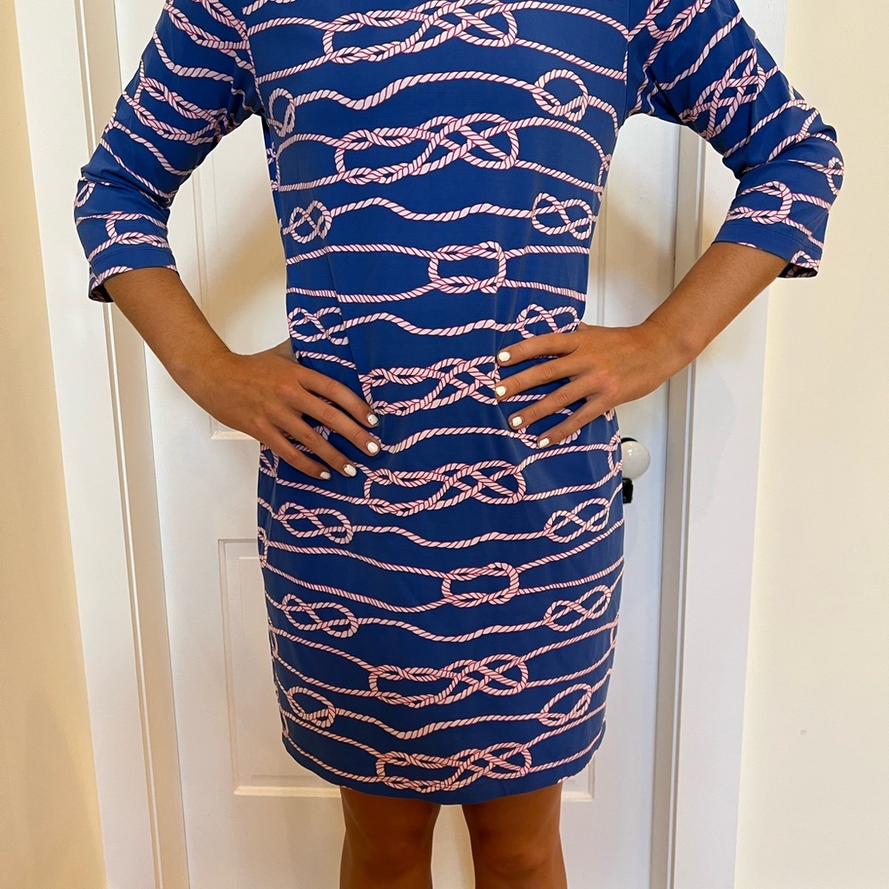 Blue dress with red and white accents